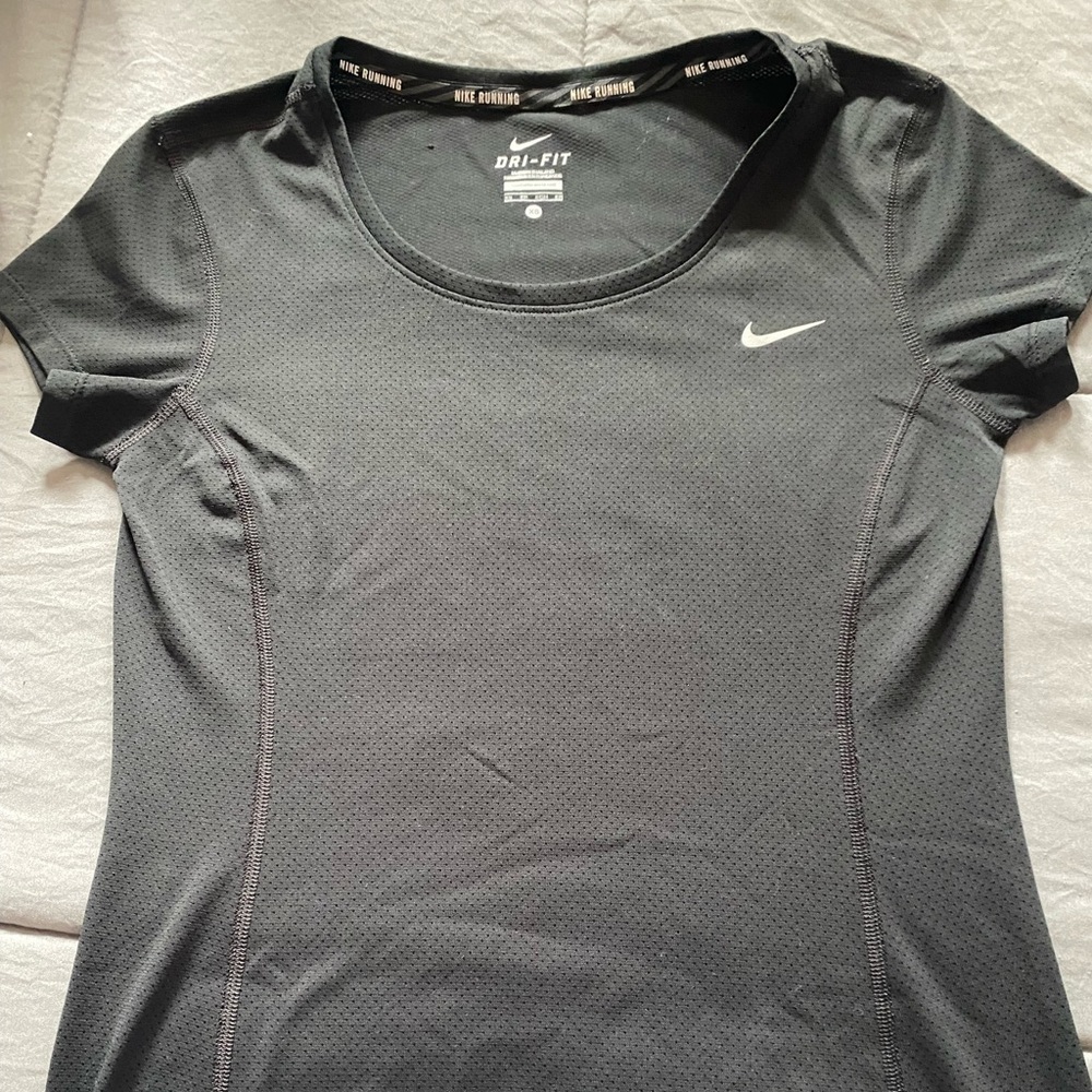 Womens Nike Dri-fit shirt.